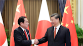 Japan walks tightrope away from China