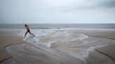 India's monsoon hits key western state, may falter next week, sources say