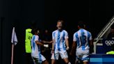 Argentina off the mark with win over Iraq; Spain through after victory