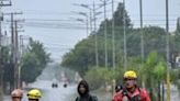 Firefighters rescue locals in a boat, at Santos Dumont neighbourhood in Sao Leopoldo, Rio Grande do Sul, Brazil, on May 12, 2024