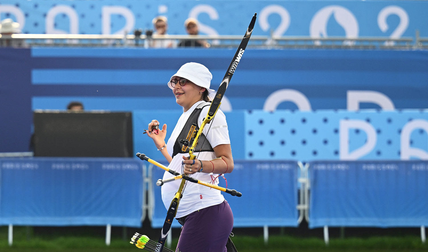 'I felt my baby kick ... then I shot a 10”: Pregnant archer stuns in Olympic victory