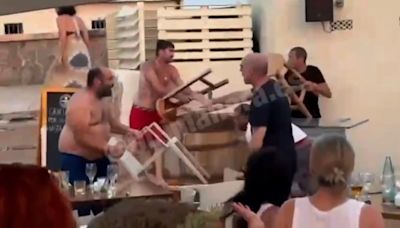 Topless drinkers chuck bar stools at staff in fight at Majorca beach club