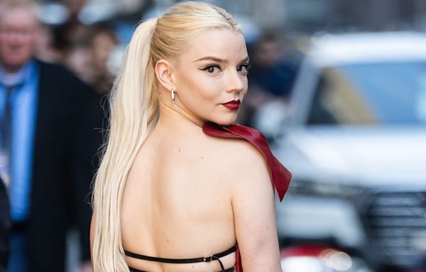 Anya Taylor-Joy flashes her bum in open-back mini dress that laces all the way up