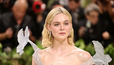 Elle Fanning Puts Icy Spin on Met Gala 2024’s Theme in ‘Crystal’ Balmain Gown With Sculpted Birds Holding Up the Sleeves