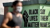 Judge awards Black church $1 million after BLM banner burned by Proud Boys during protest