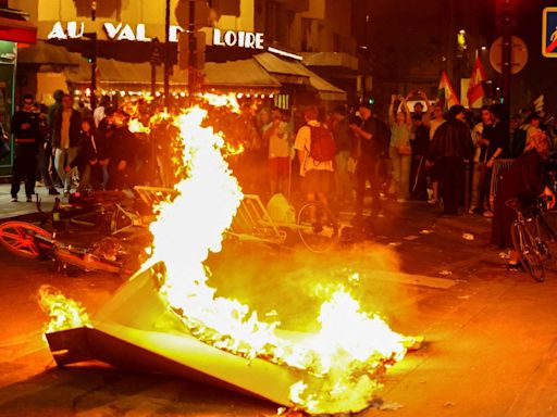 Violent protest against far-right National Rally erupt in Paris as Macron urges tactical voting