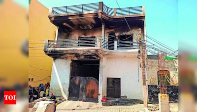 Trapped between ground floor fire & locked terrace door, 5 of family suffocate to death in Ghaziabad | Ghaziabad News - Times of India