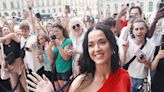 Katy Perry’s Paris Fashion Week Dress Includes an Extra Long Train and the Lyrics to ‘Woman’s World’