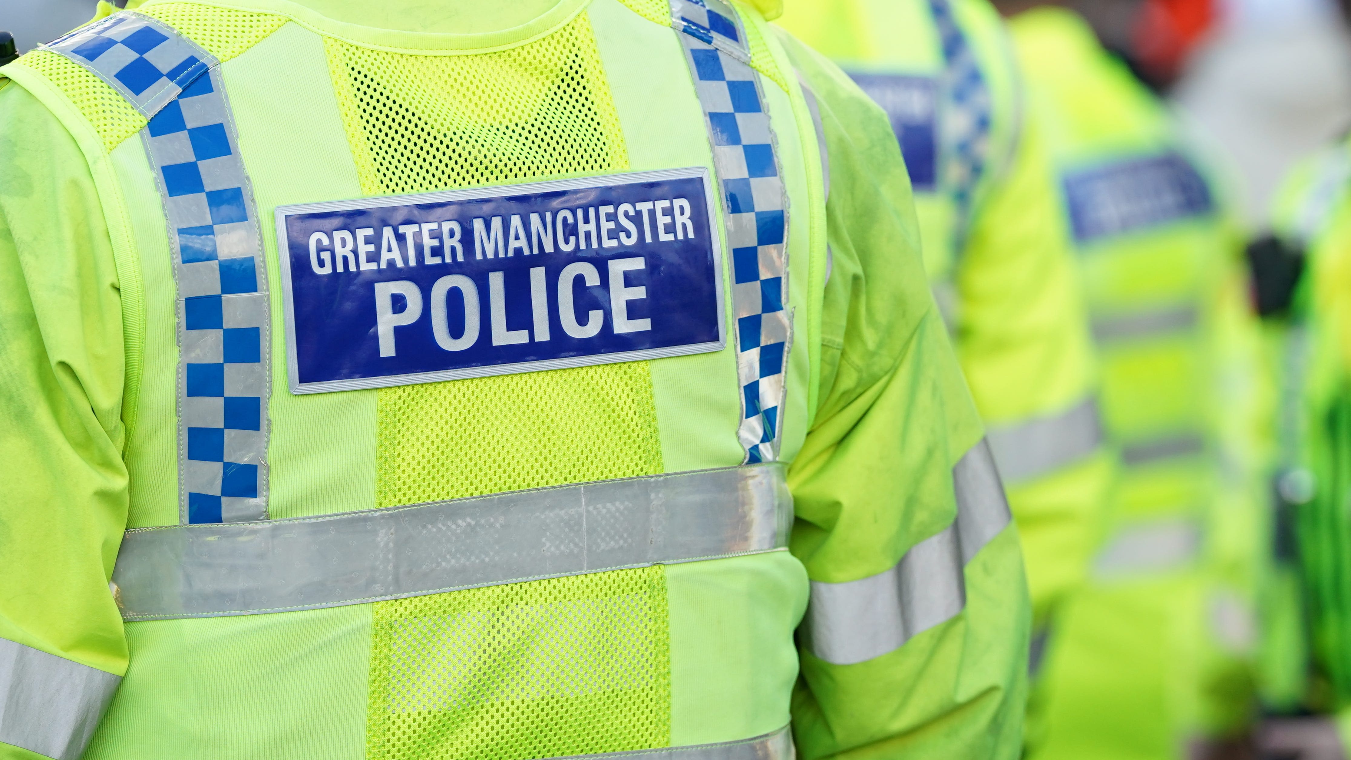 Two people arrested on suspicion of murder after man falls from Salford balcony