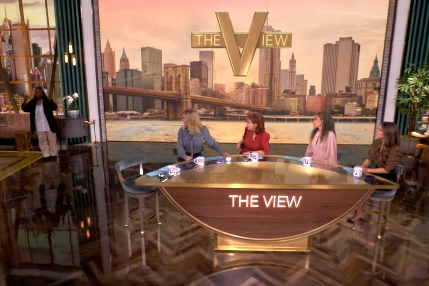 Watch Whoopi Goldberg get up from 'The View' table to demonstrate Kamala Harris' debate performance