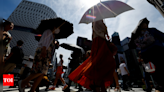 Japan issues heatstroke warning as 'cooling shelters' offer respite - Times of India