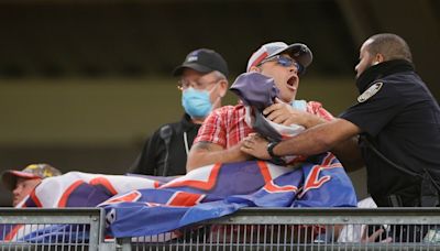 Woman forced to throw MAGA hat in trash at Cardinals game gets team's apology for staff 'misunderstanding'