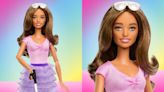 Mattel launches Barbie for visually impaired people. It comes with cane, braille packaging