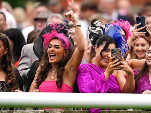 High fashion stakes! Newmarket revellers enjoy Ladies Day