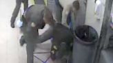 Video captures jail sergeant slamming handcuffed prisoner into metal shelves, then to floor after man spit on him
