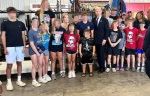 Biden poses with children in pro-Trump attire in awkward photo op in swing state Pennsylvania