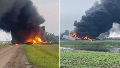 Train hauling hazardous material derails, catches fire in North Dakota