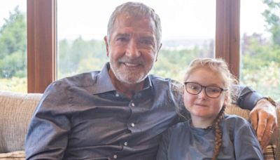 Football legend fights back tears over girl living with rare skin condition | ITV News