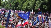 Polish opposition supporters, seeking change, mark 1989 Solidarity win