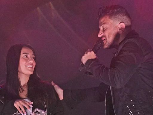 Peter Andre brings son Junior's girlfriend on stage at festival to celebrate her birthday