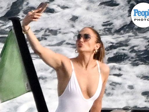 Jennifer Lopez Snaps Selfies and Poses on Bow of a Boat in Italy During Solo Summer Vacation