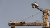 China Vanke Expects to Post First Half Loss as Sales Stall