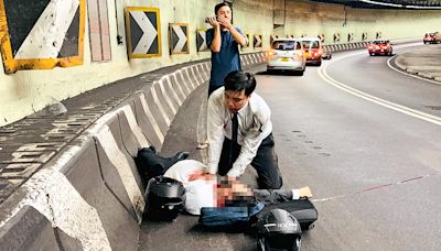 炒車致同事重創 鐵騎士施救未挽命 一手心外壓一手按頸止血 呼喊傷者名字