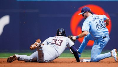 Springer hits 2 homers and Clement gets tiebreaking hit as Toronto Blue Jays beat Detroit Tigers 5-4 to avoid sweep