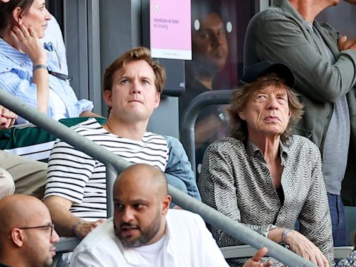 Swimming Rock Star Léon Marchand, Actual Rock Star Mick Jagger Take in Olympic Track