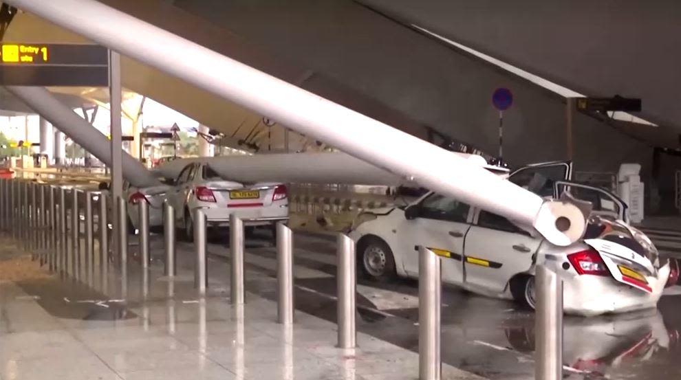 Storm brings massive part of Delhi airport roof crashing down onto cars