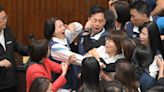 Taiwan parliament brawl escalates into night as lawmakers shove, tackle and hit each other