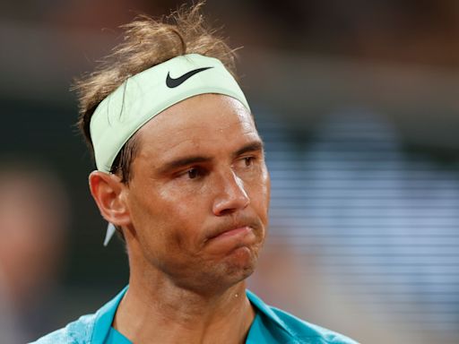 French Open day two: Rafael Nadal makes early exit but Iga Swiatek progresses