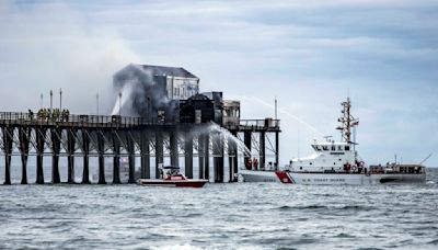 Firefighters contain destructive fire on landmark wooden pier on the Southern California coast