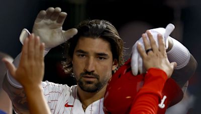 Phillies pound Cubs to secure first-round playoff bye