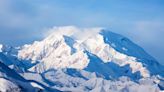 Two hypothermic climbers waiting for rescue on Denali, North America's tallest mountain