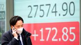 Asian shares trade mixed ahead of US jobs report