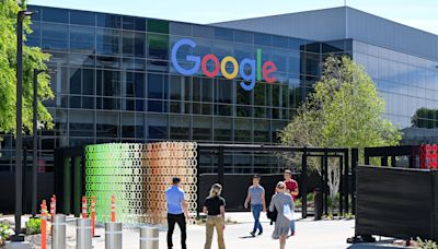 Google lays off dozens in Bay Area on way to record valuation