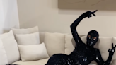 Kim Kardashian rocks black Balenciaga gown with matching ski mask: 'Modern Catwoman'