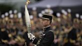 France's Bastille Day parade meets the Olympic torch relay in an exceptional year