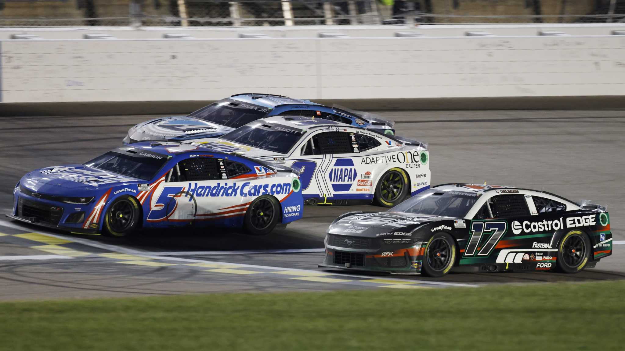 Larson edges Buescher at the line at Kansas Speedway in closest finish in NASCAR Cup Series history