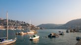 The quaint Devon town where billionaire former Spurs owner has moored his £250m superyacht all summer