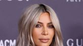 Kim Kardashian Shows Off Her Hourglass Figure In A T-Shirt And Swimwear As She Somersaults At The Beach