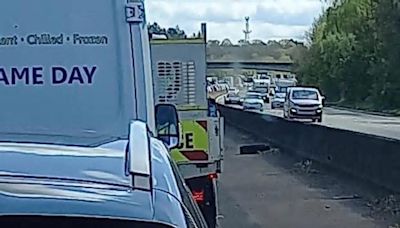 Ford Fiesta flips on its roof after crash with Mercedes on M3