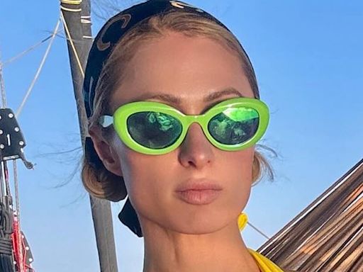 Paris Hilton sizzles in yellow bikini during family yacht trip