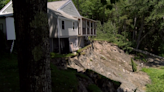 A landslide leaves a family home in jeopardy and homeowners say, 'it's not done yet'