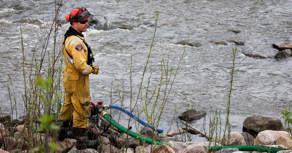 Wildfire near Canada’s oil sands hub under control, Alberta officials say