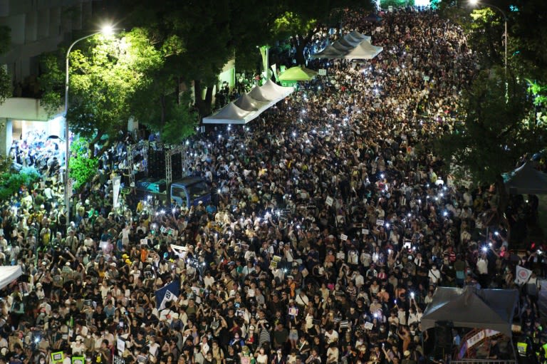 Tens of thousands protest Taiwan parliament bills to 'defend democracy'