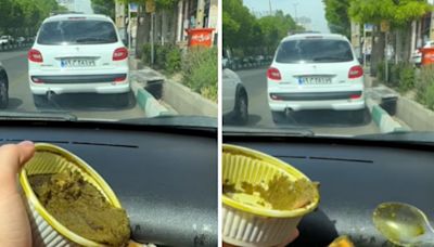 Man Eats Meal Directly From Car Dashboard, Internet Question His Sense Of Hygiene - News18