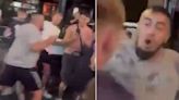 Moment England fans attacked outside bar after singing controversial war song