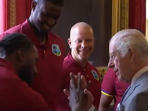 King Charles Learns New Handshake as he Welcomes West Indies' Squad to Buckingham Palace - WATCH - News18